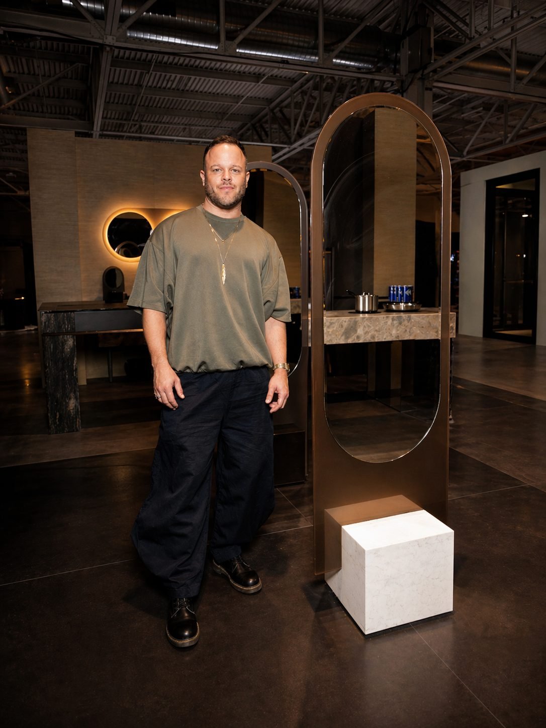 Designer Benoit Gerard with the Alice mirror in the studio