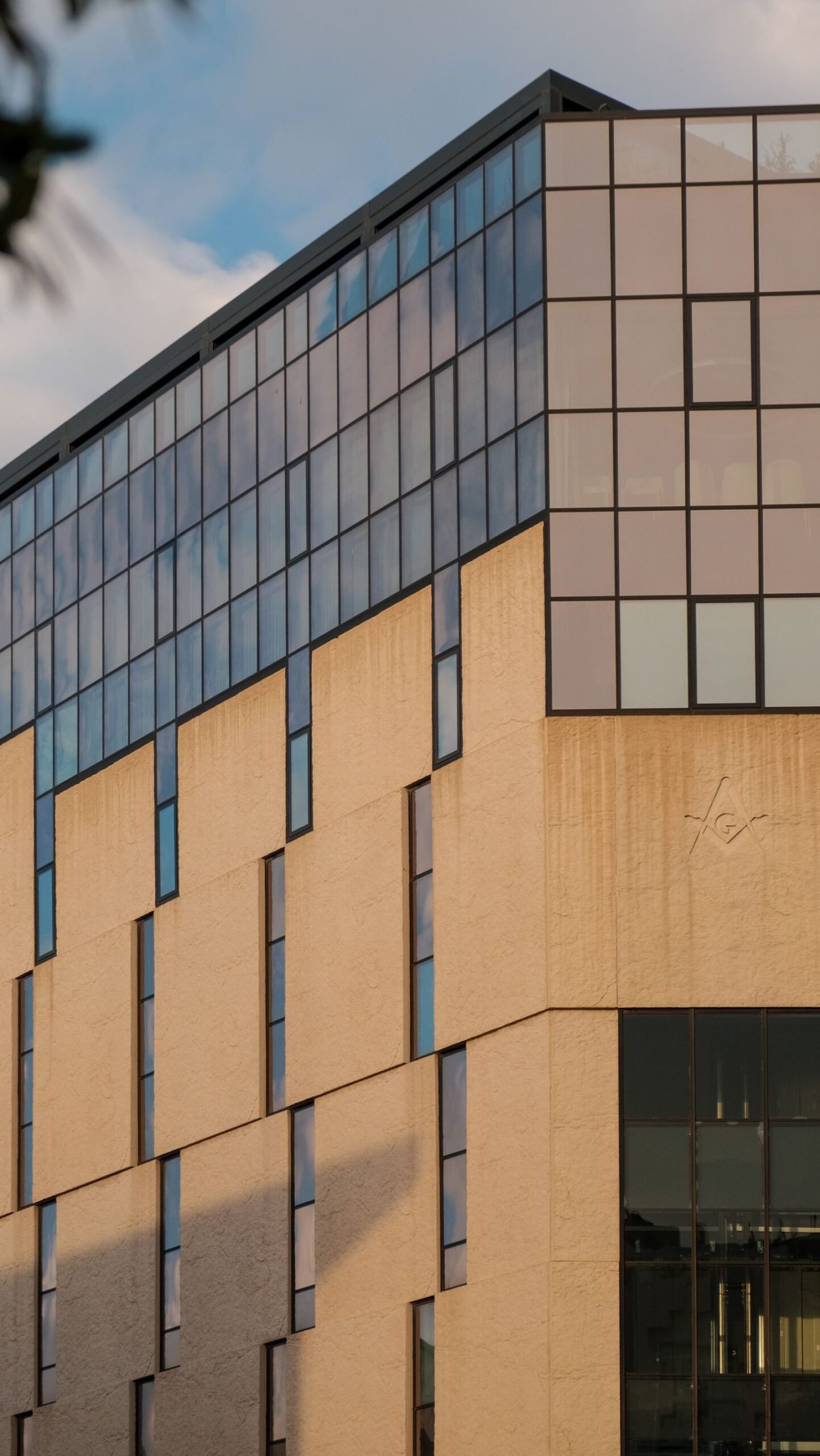 Exterior of a modern building with clean geometric lines against the sky