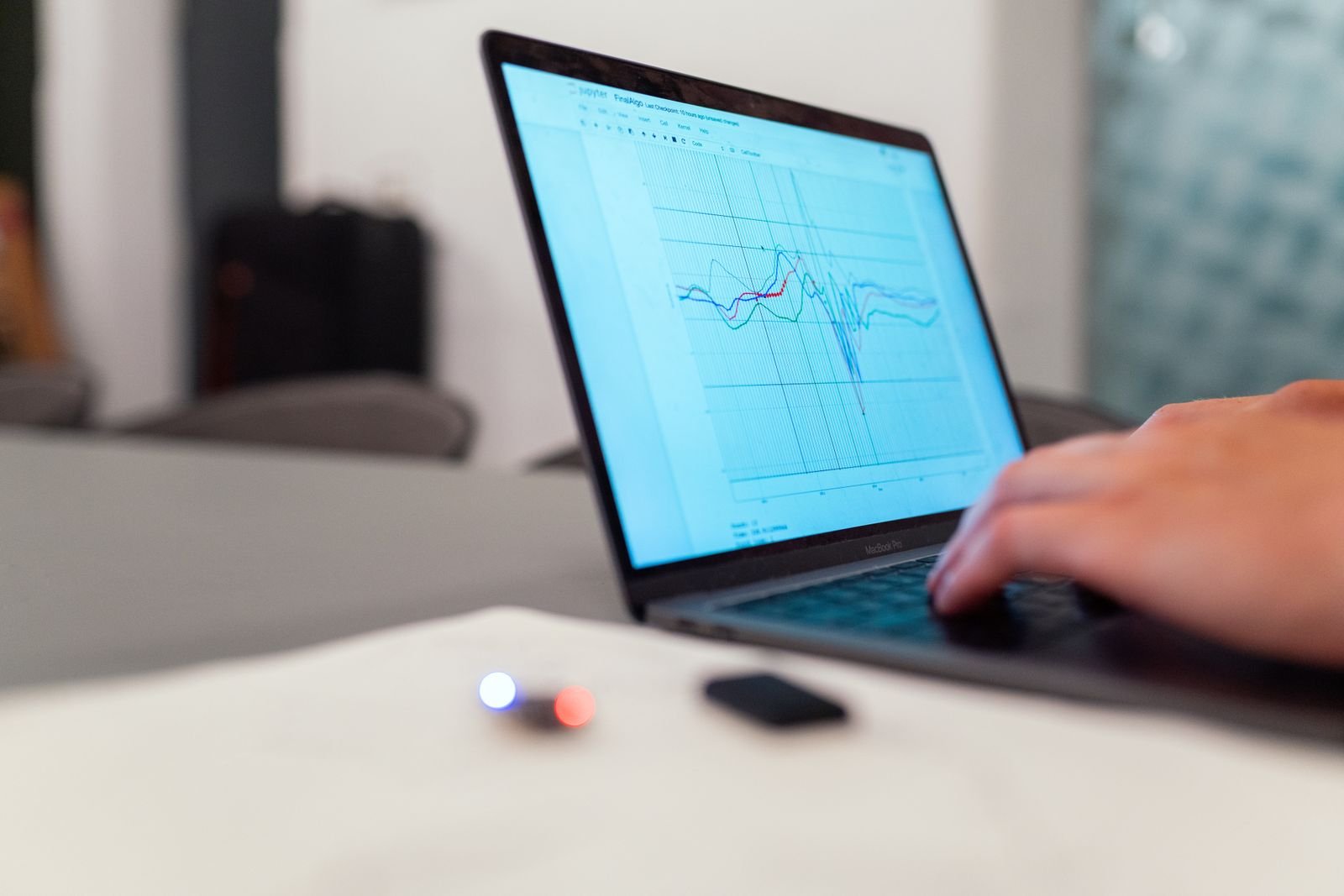 Line graph displayed on a laptop screen on a work desk
