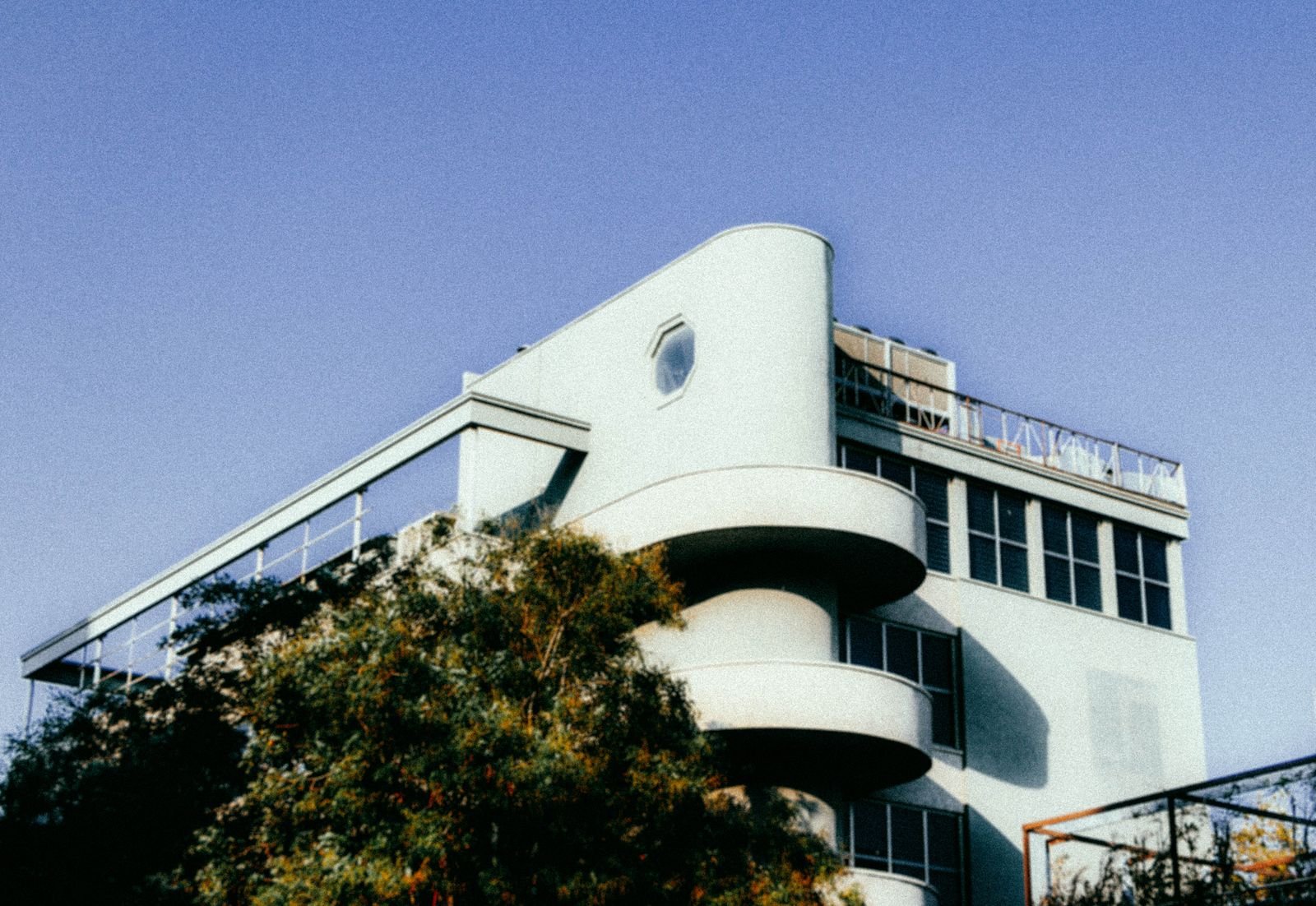 Exterior of an Art Deco building with stepped massing and vertical detailing