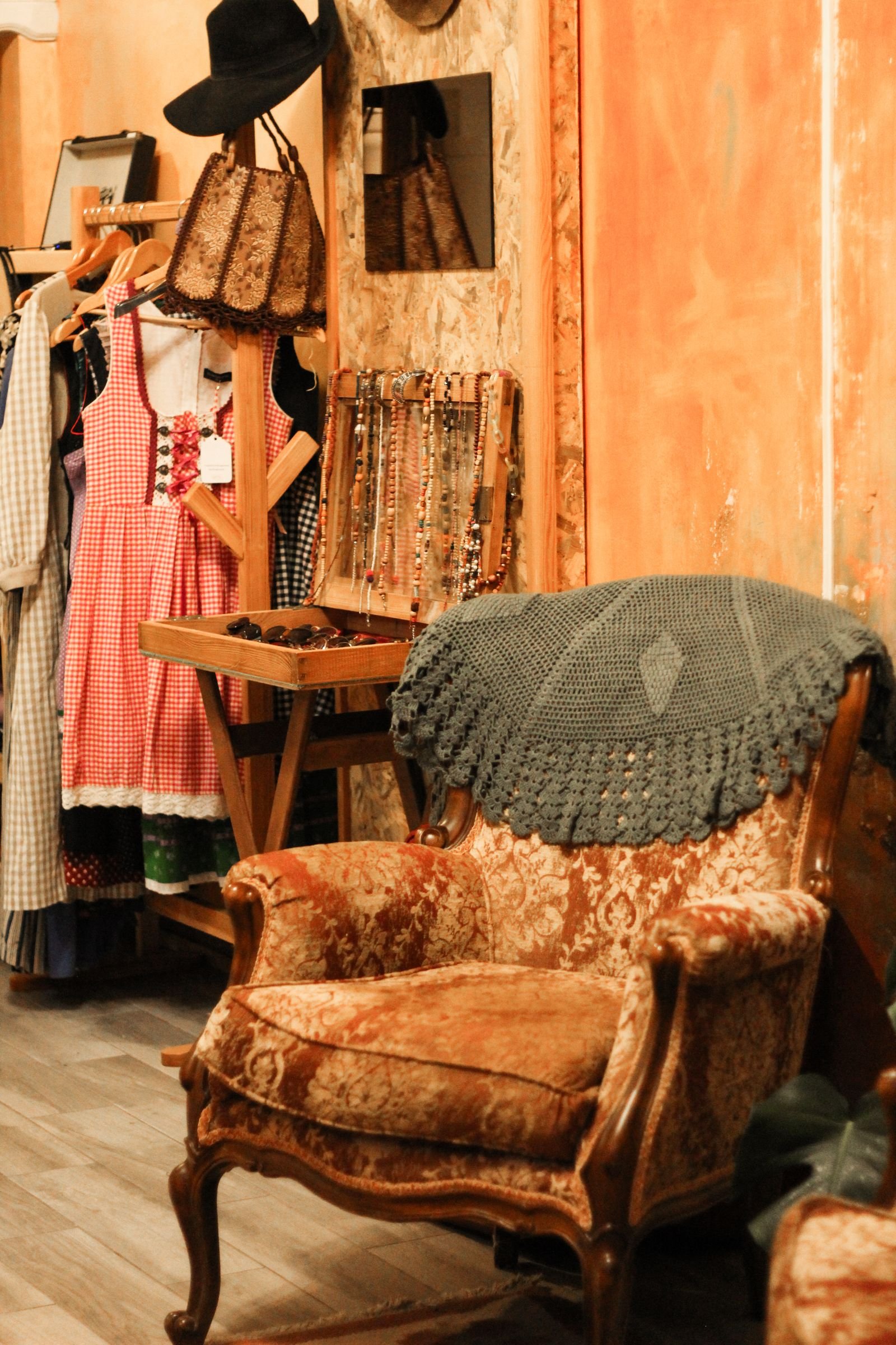 Vintage store interior with retro furniture and objects arranged on shelves